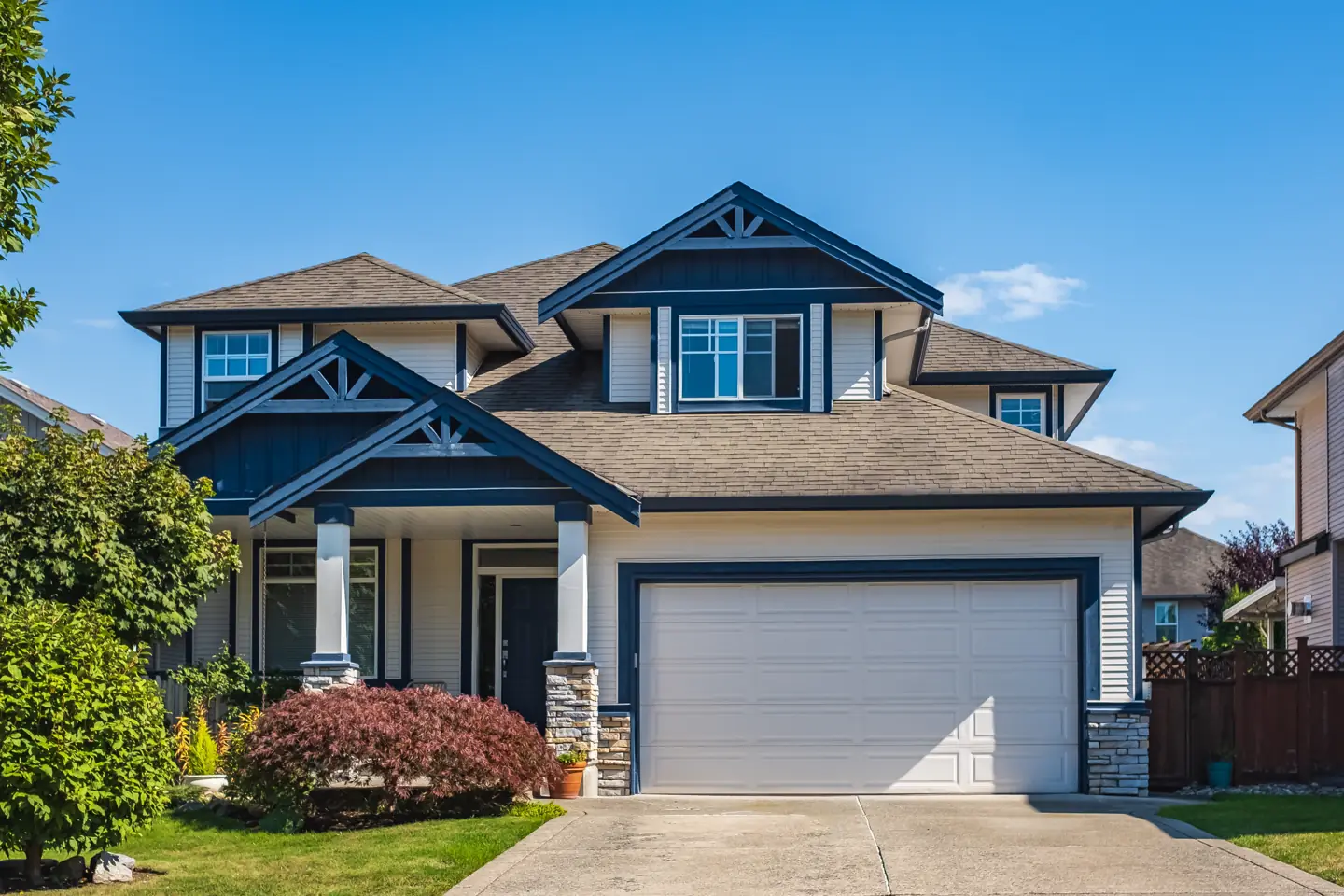 Two-story custom home with craftsman details built by Go To Guys RGV