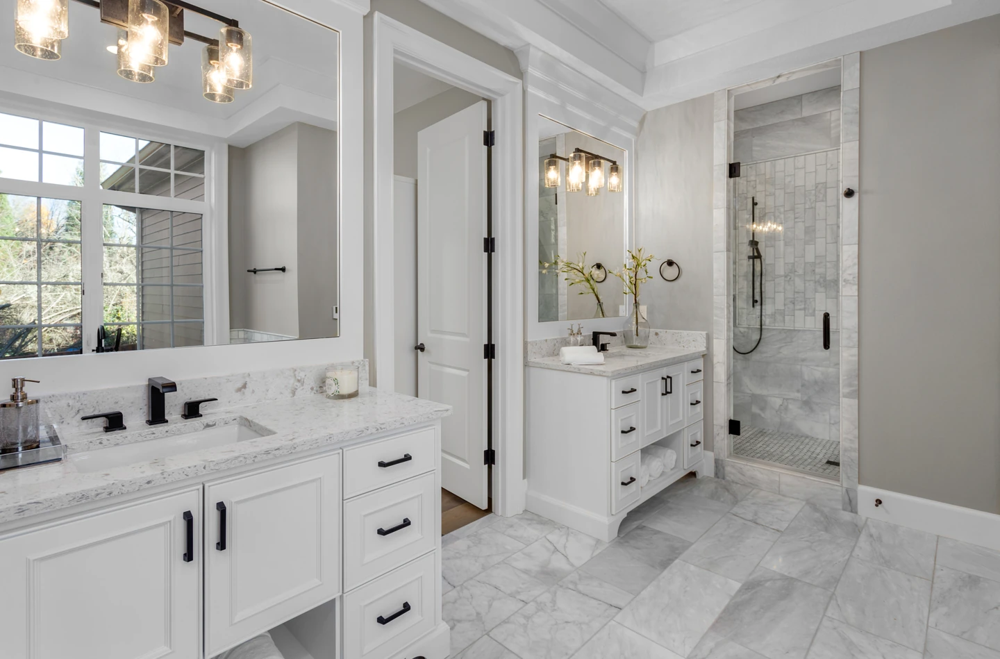 Luxury bathroom remodel with marble flooring and double vanity